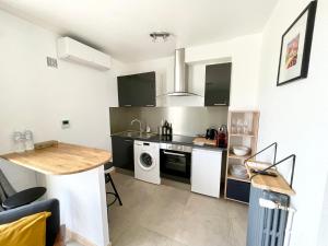 Appartements MonAppart-Hotel - Appartement Lumineux avec Clim et Parking : photos des chambres