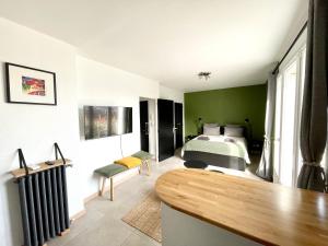 Appartements MonAppart-Hotel - Appartement Lumineux avec Clim et Parking : photos des chambres