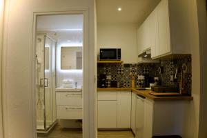 Appartements Le Dreamy - Terrasse et parking : photos des chambres