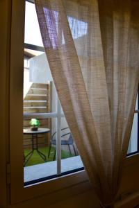 Appartements Le Dreamy - Terrasse et parking : photos des chambres