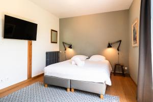 Appartements MonAppart-Hotel - Appartement Lumineux avec Clim et Parking : photos des chambres