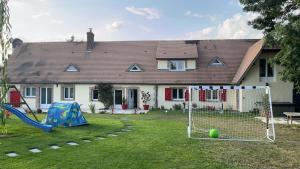 Maisons de vacances la longere aux volets rouges : photos des chambres