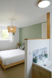 Maisons de vacances la longere aux volets rouges : photos des chambres