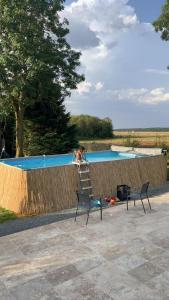 Maisons de vacances la longere aux volets rouges : photos des chambres