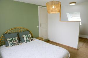 Maisons de vacances la longere aux volets rouges : photos des chambres