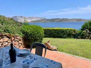 Villaggio Est 2 camere con Giardino Vista Mare