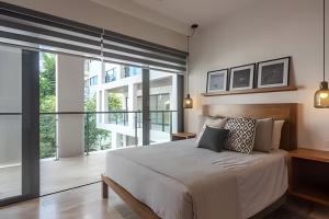 Apartamento de diseño bohemio de 2 dormitorios con enorme piscina en la azotea