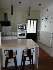 Appartements La Parenthese Comtoise : photos des chambres
