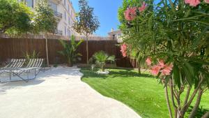 Appartements Cannes - Appartement 4 pieces - jardin - proche Palais des Festivals : photos des chambres