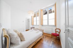 Appartements Le Home Carnot - Hypercentre de Beaune : photos des chambres