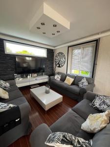Maisons de vacances Maison familiale avec piscine : photos des chambres