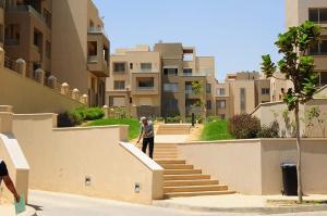 Stunning Gated 2 BR-Mins To AUC