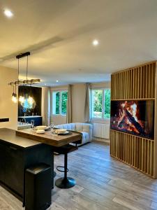 Appartements La Suite Aimee - Espace relaxant avec balneo : photos des chambres