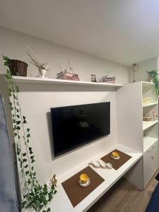 Studio com piscina e vista