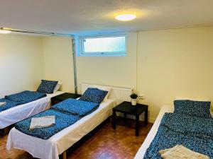 Cozy room with 3 single bed in Landskrona