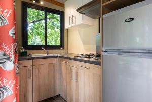 Campings Camping Onlycamp La Potiniere : photos des chambres