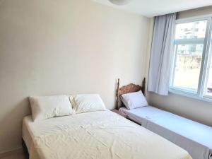 Apartamento totalmente climatizado de 2 quartos na Praia da Costa - Distante 150 metros da praia