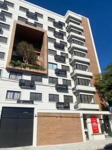 Flat moderno Garagem AR cond Jardim Amália VR