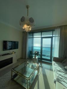 Corniche Residence Beach view Pool access Stunning View