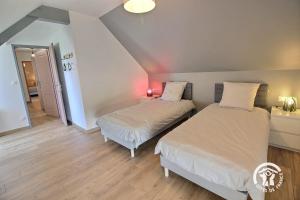 Maisons de vacances Le ptit bois rolland : photos des chambres