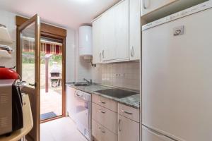 Apartamento con jardín privado