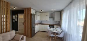 Nowoczesny jasny apartament nad Jeziorem