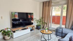 T4 avec grande terrasse - BBQ - parking