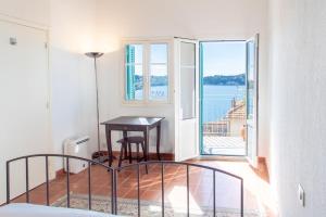 Appartements #50 Contesso Duplex -1BDR, Sea View Terrace & AC : photos des chambres