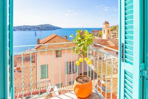 Appartements #50 Contesso Duplex -1BDR, Sea View Terrace & AC : photos des chambres