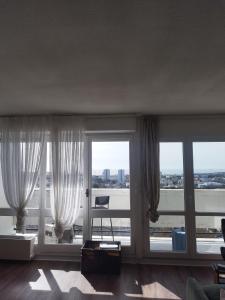 Appartements Grand appartement vue mer : photos des chambres