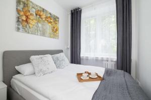 Bright Two-Bedroom Apartment in Nowa Huta by Noclegi Renters