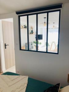 Appartements Logement cosy en centre ville : photos des chambres