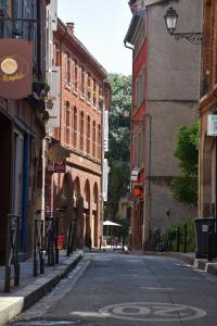 Appartements Le Paradoux - Luxe & Brique au coeur de Toulouse : photos des chambres