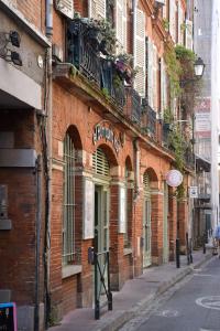Appartements Le Paradoux - Luxe & Brique au coeur de Toulouse : photos des chambres