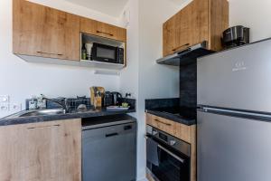 Appartements Bassin & Perla, Appartement T2, a 10mns de la Dune du Pilat et de l-Ocean : photos des chambres