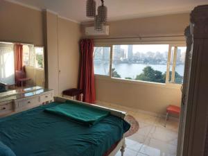 ايجار شقة فندقية مفروشة علي النيل امام مسجد صلاح الدين