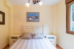 Apartamento con jardín privado