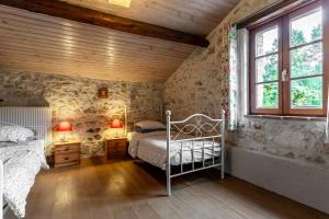 Maisons de vacances Domaine de Gargoris - Grote grange met zwembad en tuin : photos des chambres