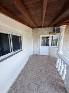 Denaj House