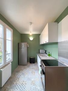 Appartements 10min de Disney Duplex 2ch avec Parking & Balcon : photos des chambres