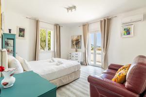 Villas LA VILLA DES FLEURS en duplex avec jardin et piscine : photos des chambres
