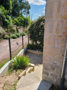 Maisons de vacances Maison en pierre de Caen charmante et confortable et sa terrasse privative entre terre et mer : photos des chambres
