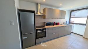 Appartements La Petite Vue, Logement Climatis : photos des chambres