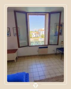 Appartements AGDE : Vue exceptionnelle sur le Fleuve et grand appartement de 2 chambres au coeur du centre historique d-Agde. : photos des chambres