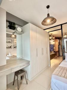 Aizas Place in Shell Residences MOA