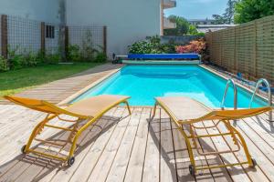 Maisons de vacances Maison de centre-ville avec piscine : photos des chambres