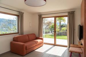Felsenegg appartements - moderne Wohnungen im Luftkurort mit traumhaftem Garten Nähe Meran für Paare und Familien