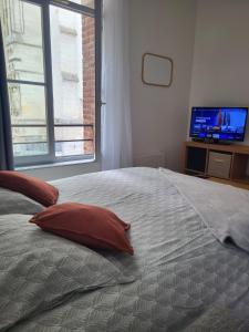 Appartements charmant studio avec vue cathedrale : photos des chambres