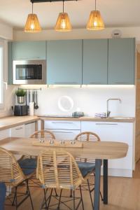 Appartements COC - Le Cocon des 2 Caps : photos des chambres