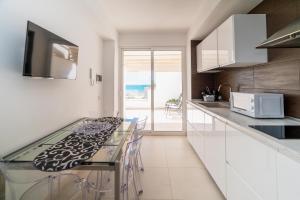 MADAGÌ Beachfront Apartments